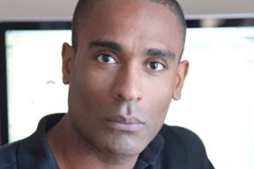 Professional portrait of Carlos Simpson - Brand Designer, Executive Mentor Coach, founder of Carlos Simpson Design Studio.