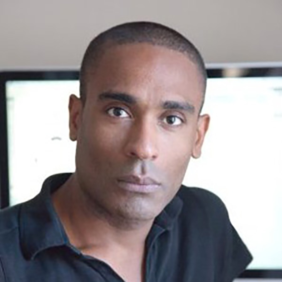 Professional portrait of Carlos Simpson - Brand Designer, Executive Mentor Coach, founder of Carlos Simpson Design Studio.