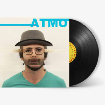 Vinyl cover for “ATMO,” the sixth studio album by Carlos Simpson, featuring a half-portrait of the artist in a minimalist layout with bold typography.