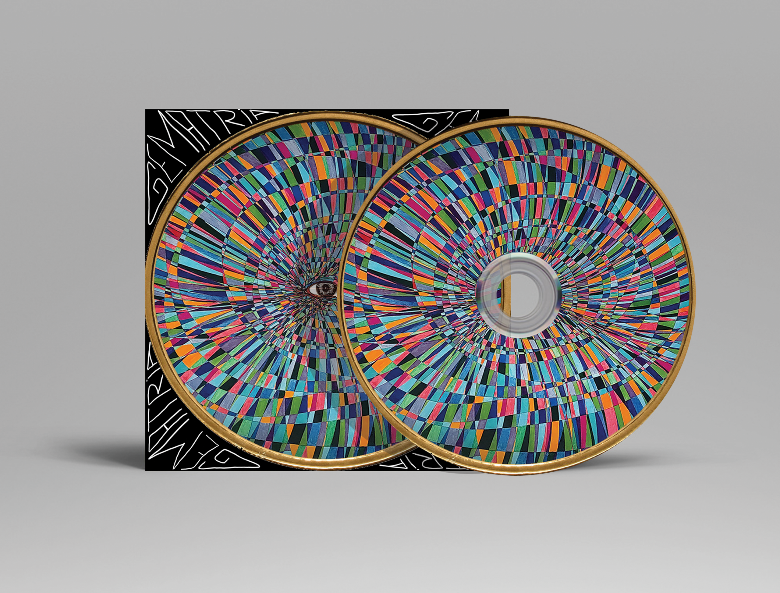 GEMATRIA – Album Art by Carlos Simpson (2023) Album cover design for “GEMATRIA” by Carlos Simpson – featuring a vibrant, symmetrical eye motif across dual CDs, symbolizing perception, spiritual coding, and universal alignment.